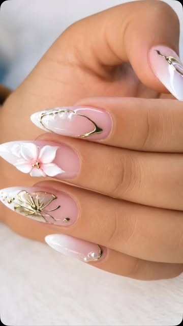 Elegant nude almond nails with gold-foil art and glitter